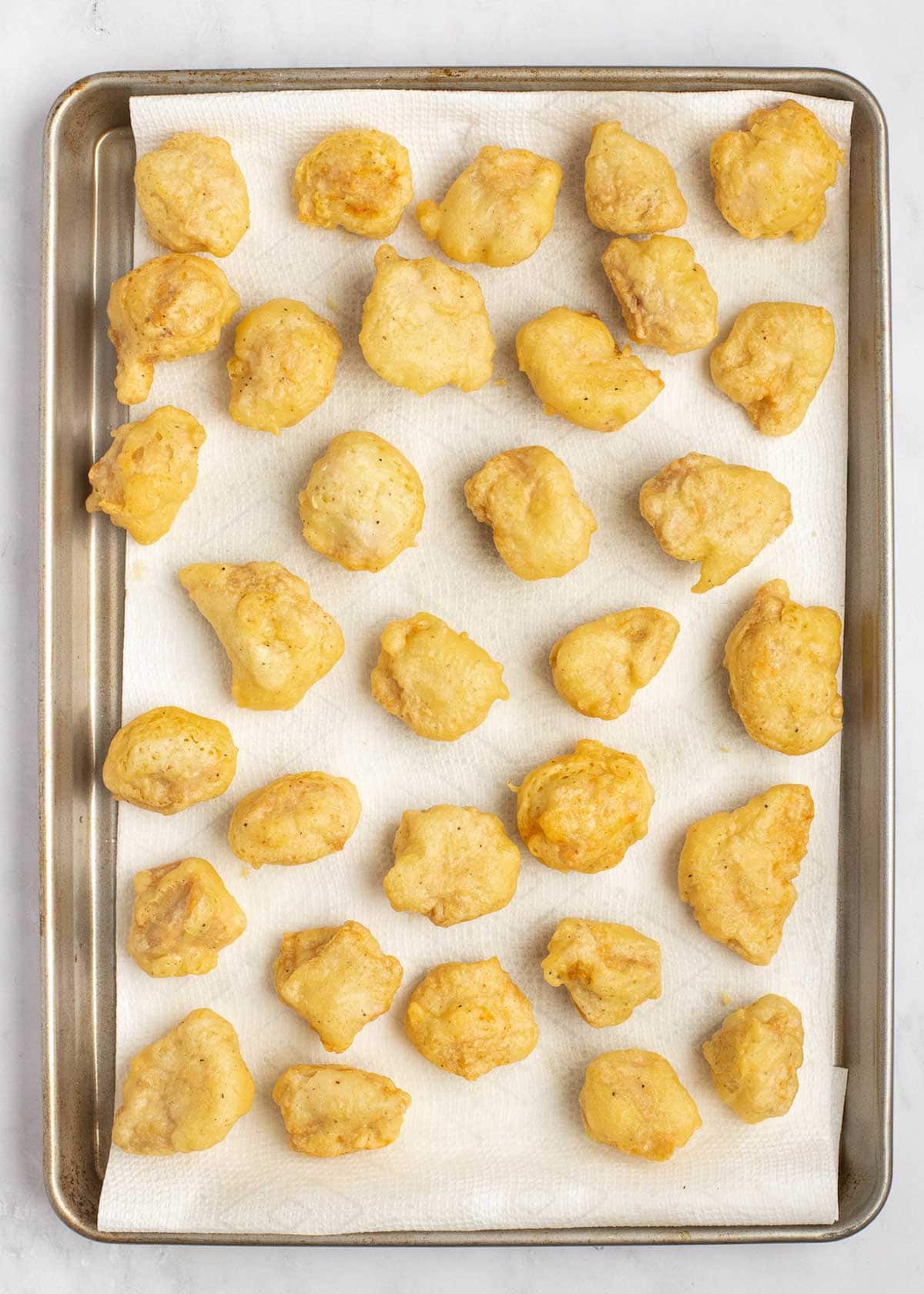 fried chicken on sheet pan