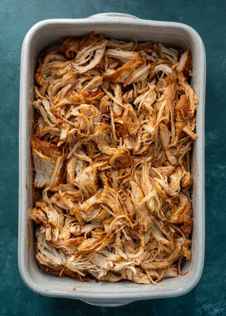 shredded chicken in baking dish