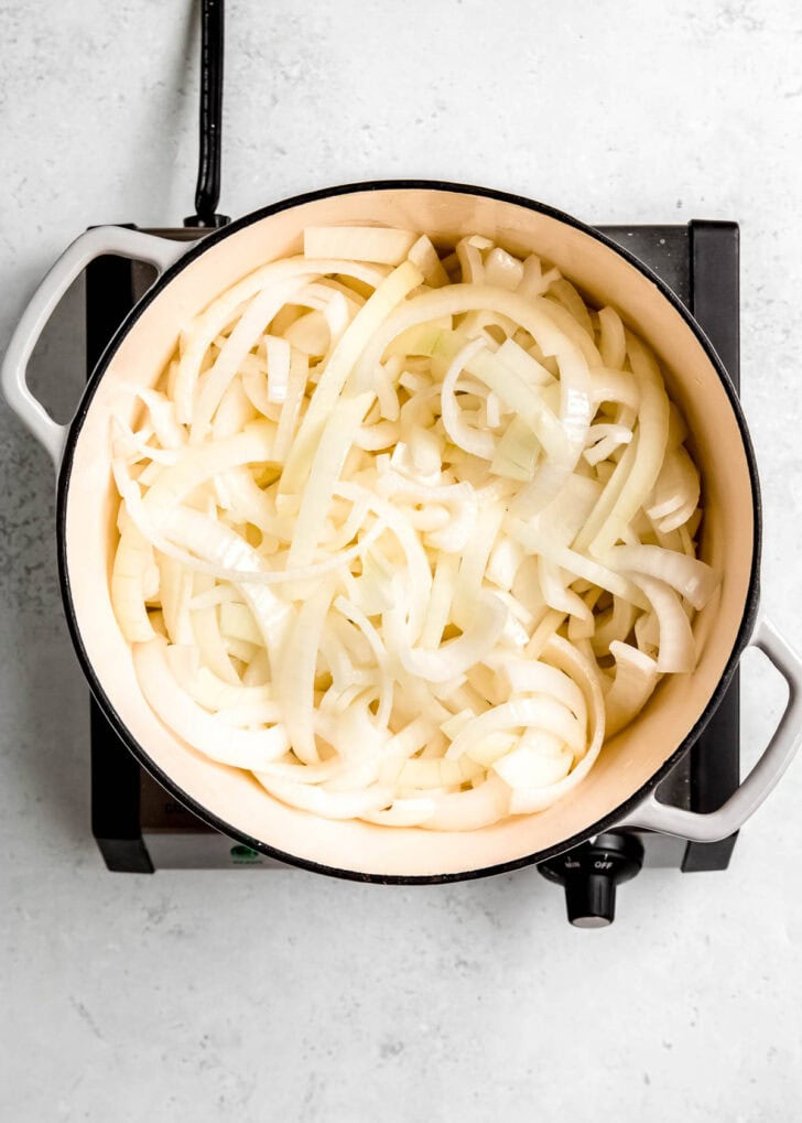 3 pounds of onions sliced and tossed in melted butter in a large pot