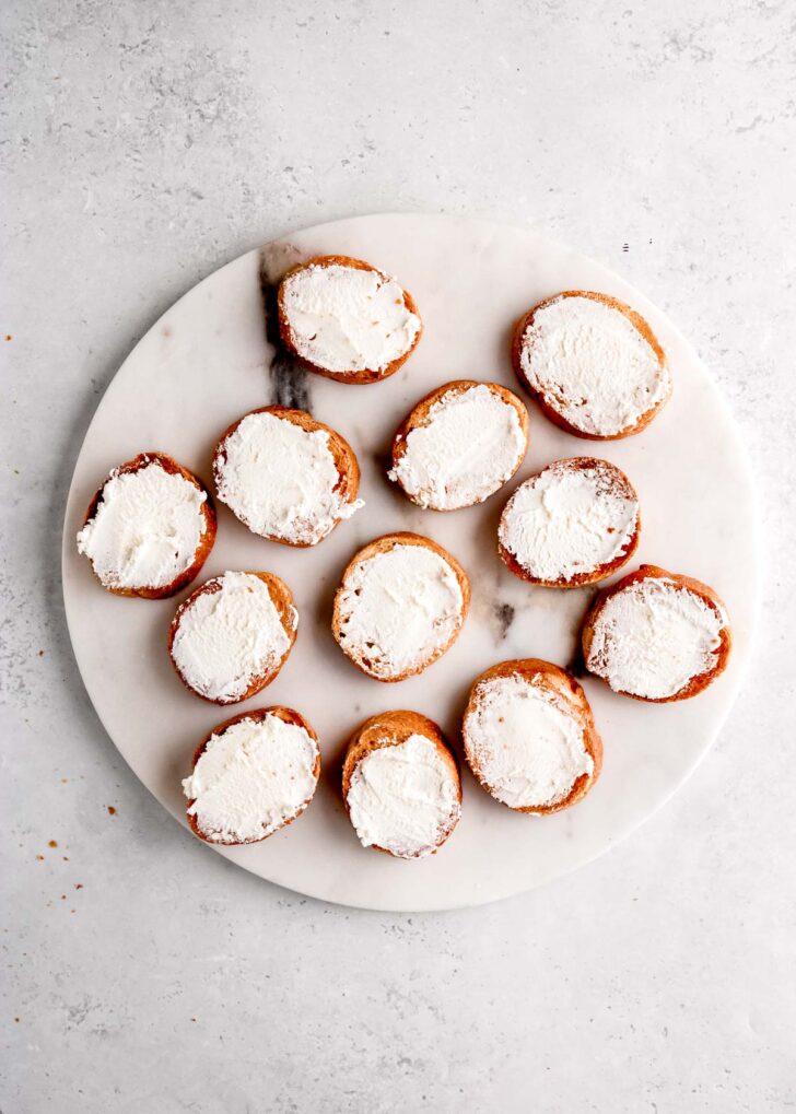 goat cheese spread over crostini 