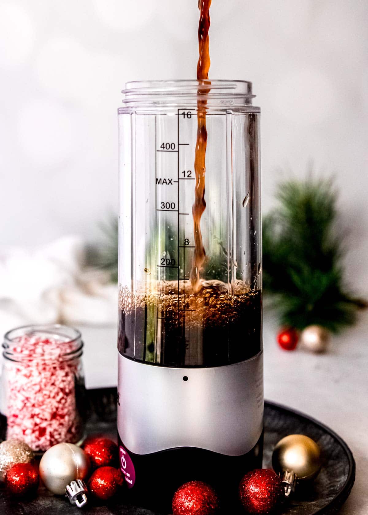 coffee being poured into a blender