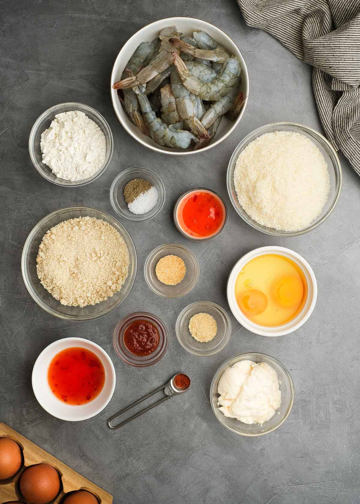 all ingredients needed for gluten-free popcorn shrimp recipe on a gray countertop