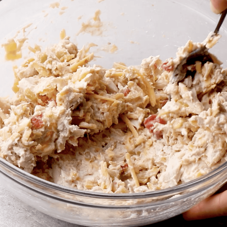 chimichanga chicken mix being stirred in mixing bowl