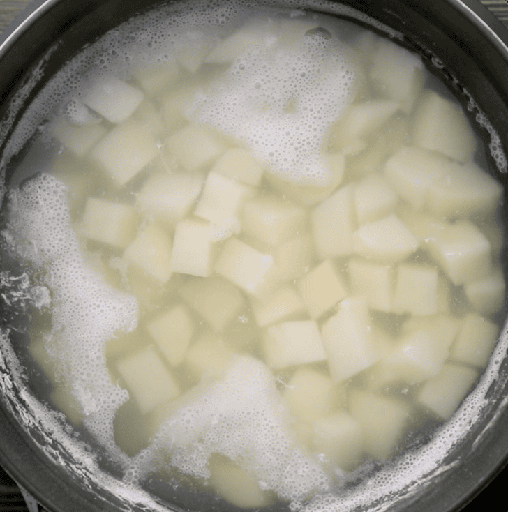 potatoes boiling in pot