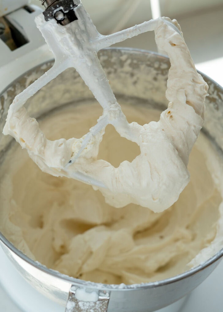 whipped cream cheese frosting on a paddle